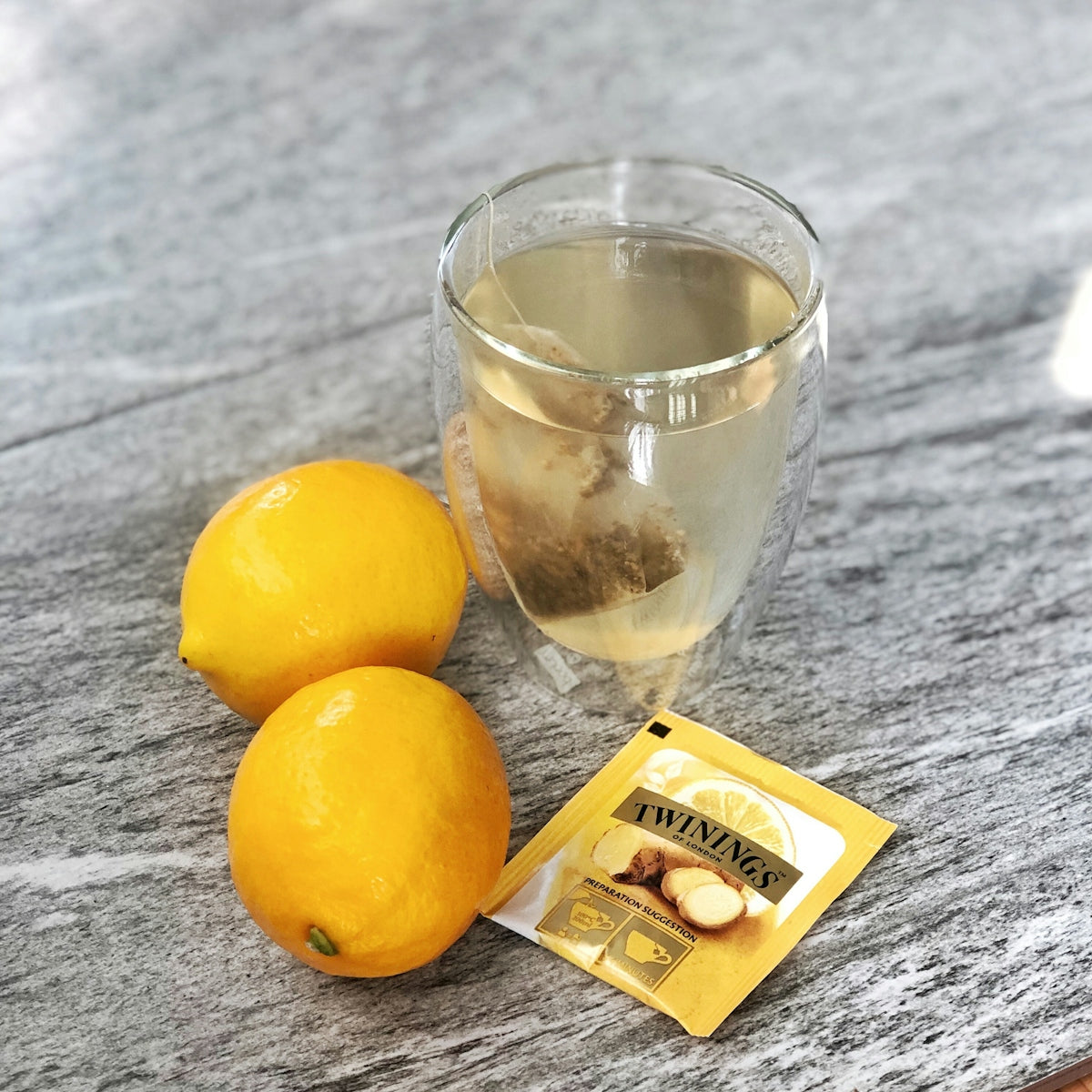 clear drinking glass beside lemonades