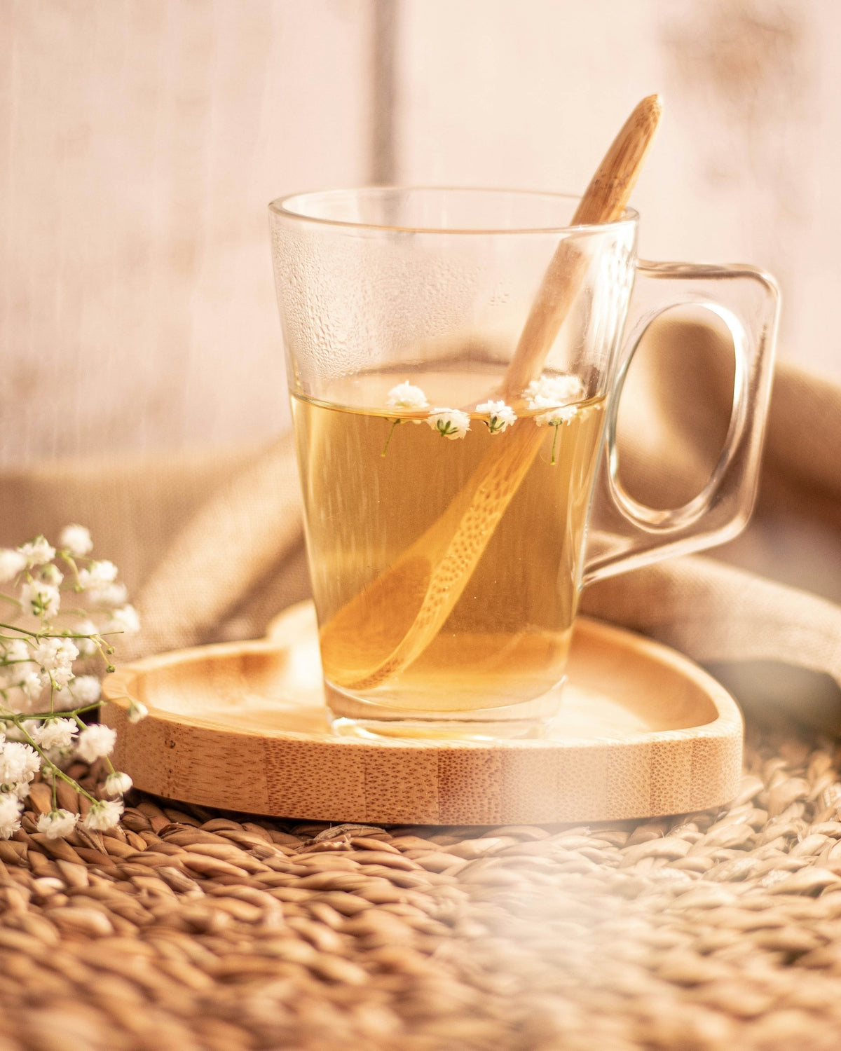 a cup of tea with a spoon in it