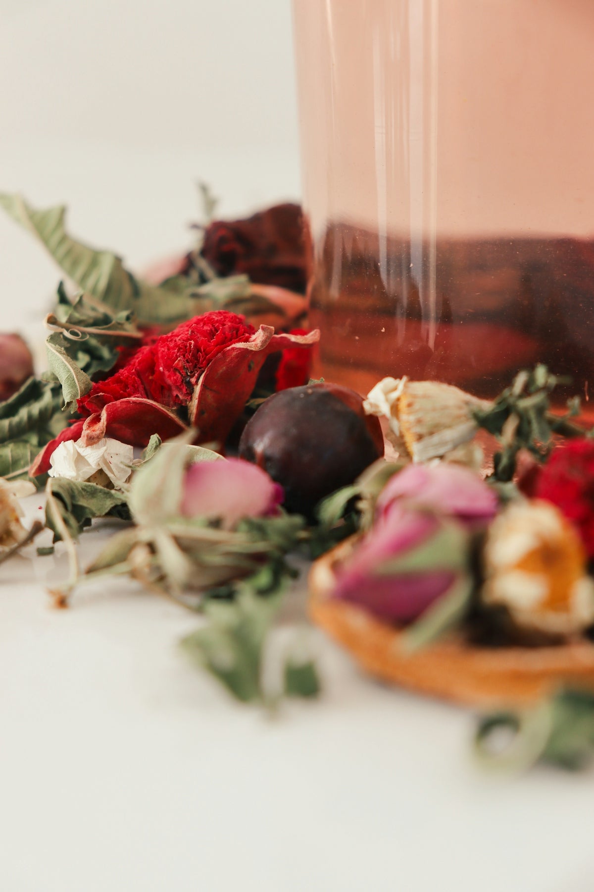 a close up of a vase filled with flowers