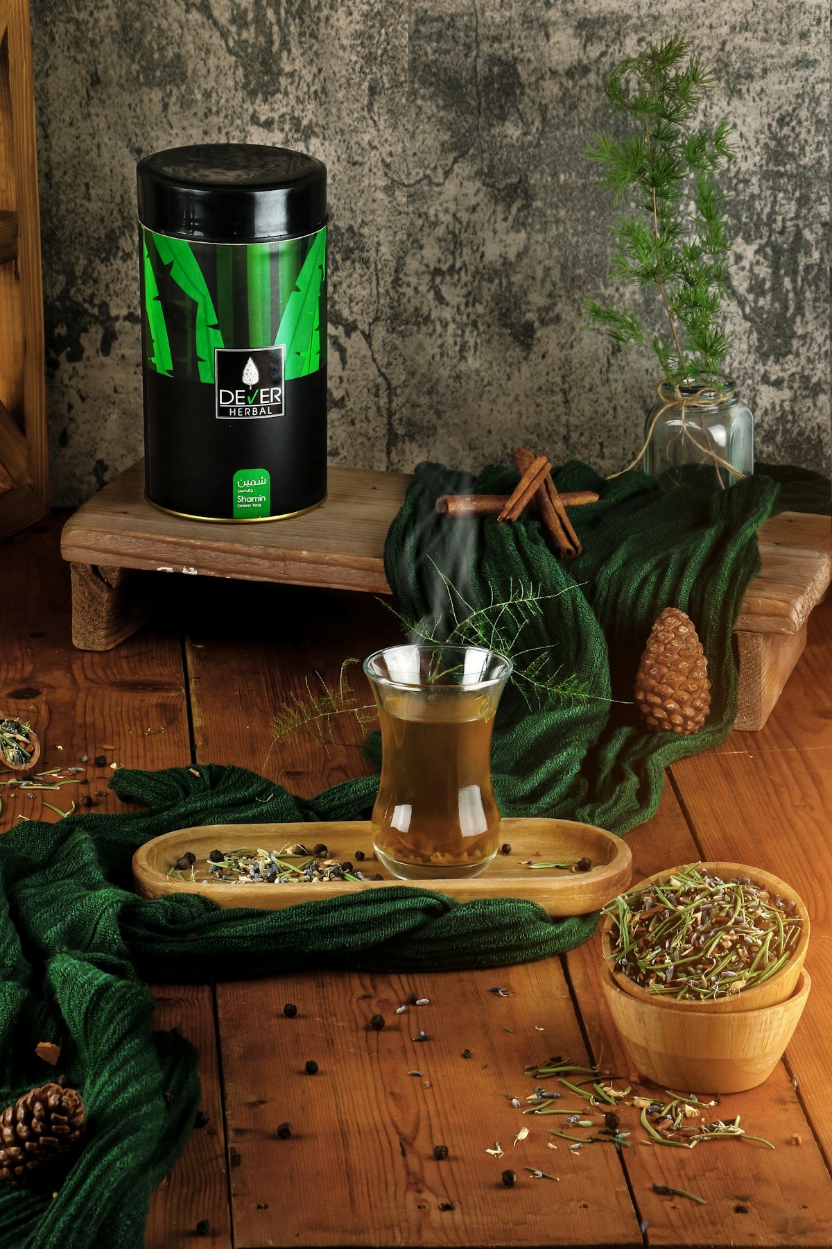 a table with plants and a coffee maker on it